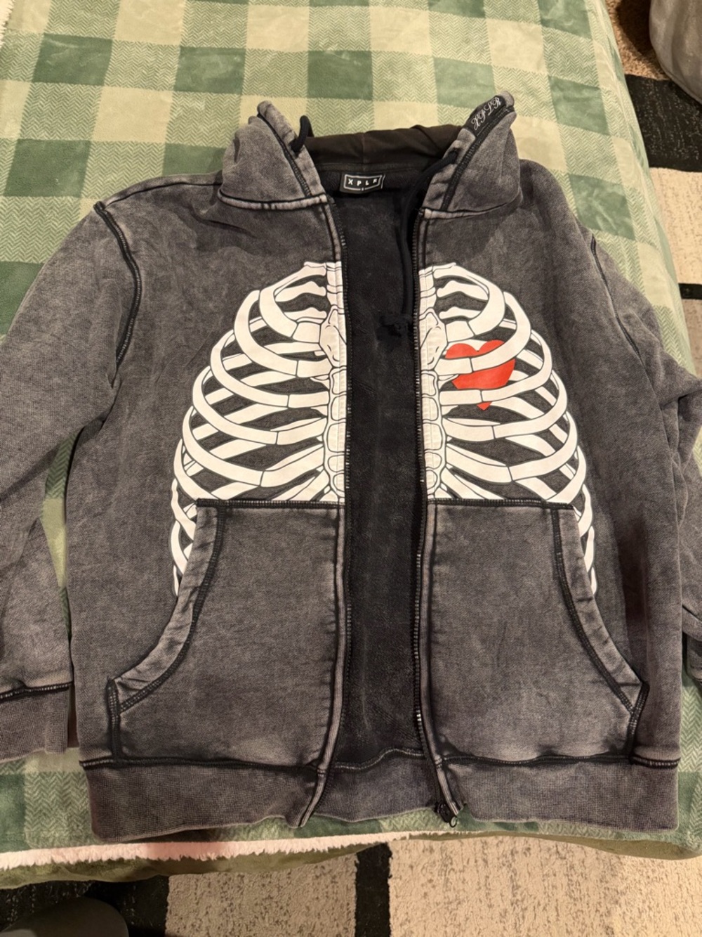 Sam and Colby XPLR Washed Black Zip-Up Hoodie with Rib Cage Graphic